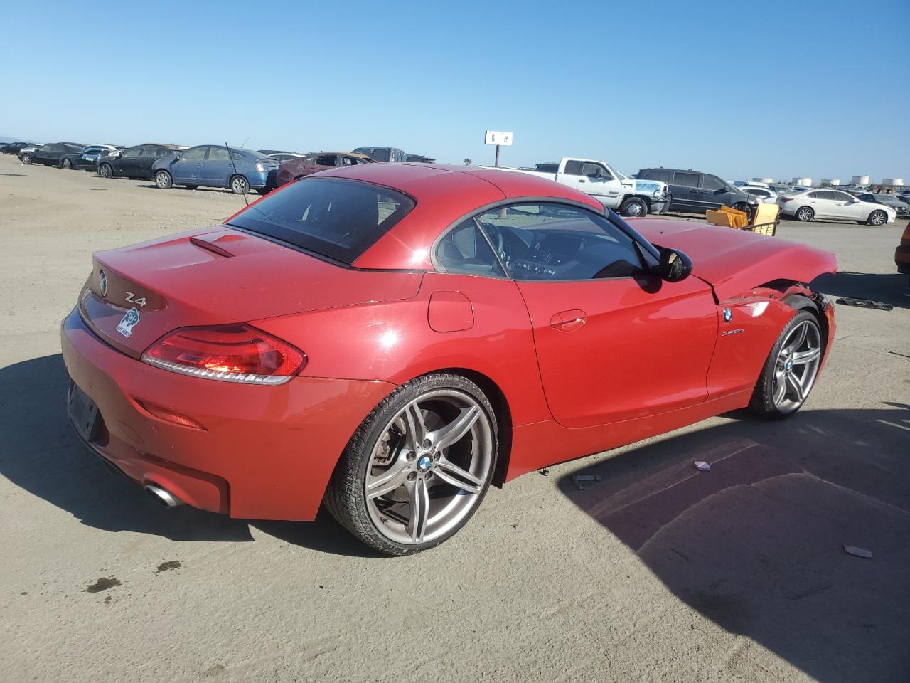 2012 BMW Z4 VIN WBALM1C58CE633610 Copart auction photo, front end damage thumbnail 3
