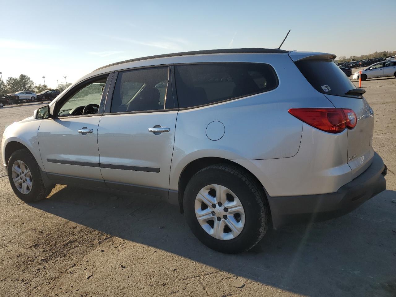 2010 Chevrolet Traverse VIN 1GNLREED6AJ261468 Copart auction photo, side / rear end damage thumbnail 2