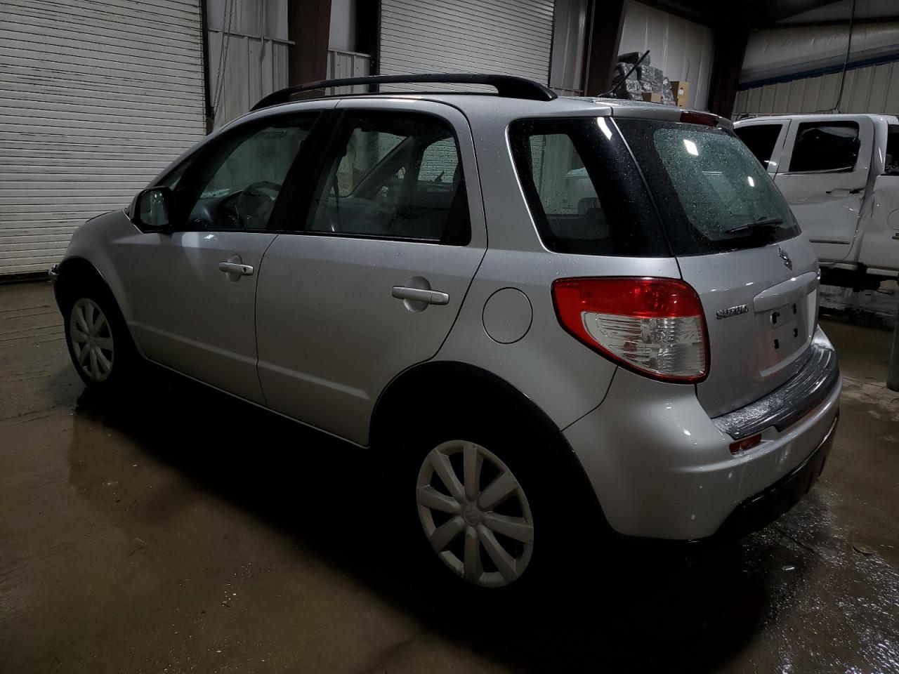 2011 Suzuki SX4 VIN JS2YB5A39B6303044 Copart auction photo, front end / rear end damage thumbnail 2