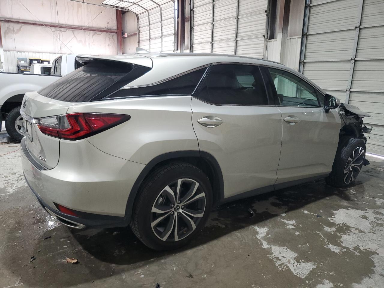 2021 Lexus RX VIN 2T2HZMAA0MC214002 Copart auction photo, side / undercarriage damage thumbnail 3