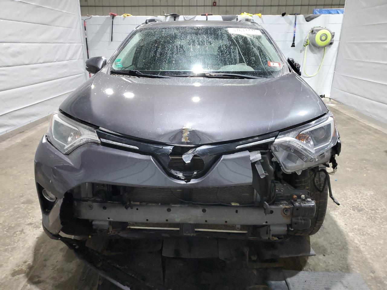 2016 Toyota RAV 4 VIN JTMRFREV6GJ088829 Copart auction photo, front end / all over damage thumbnail 5