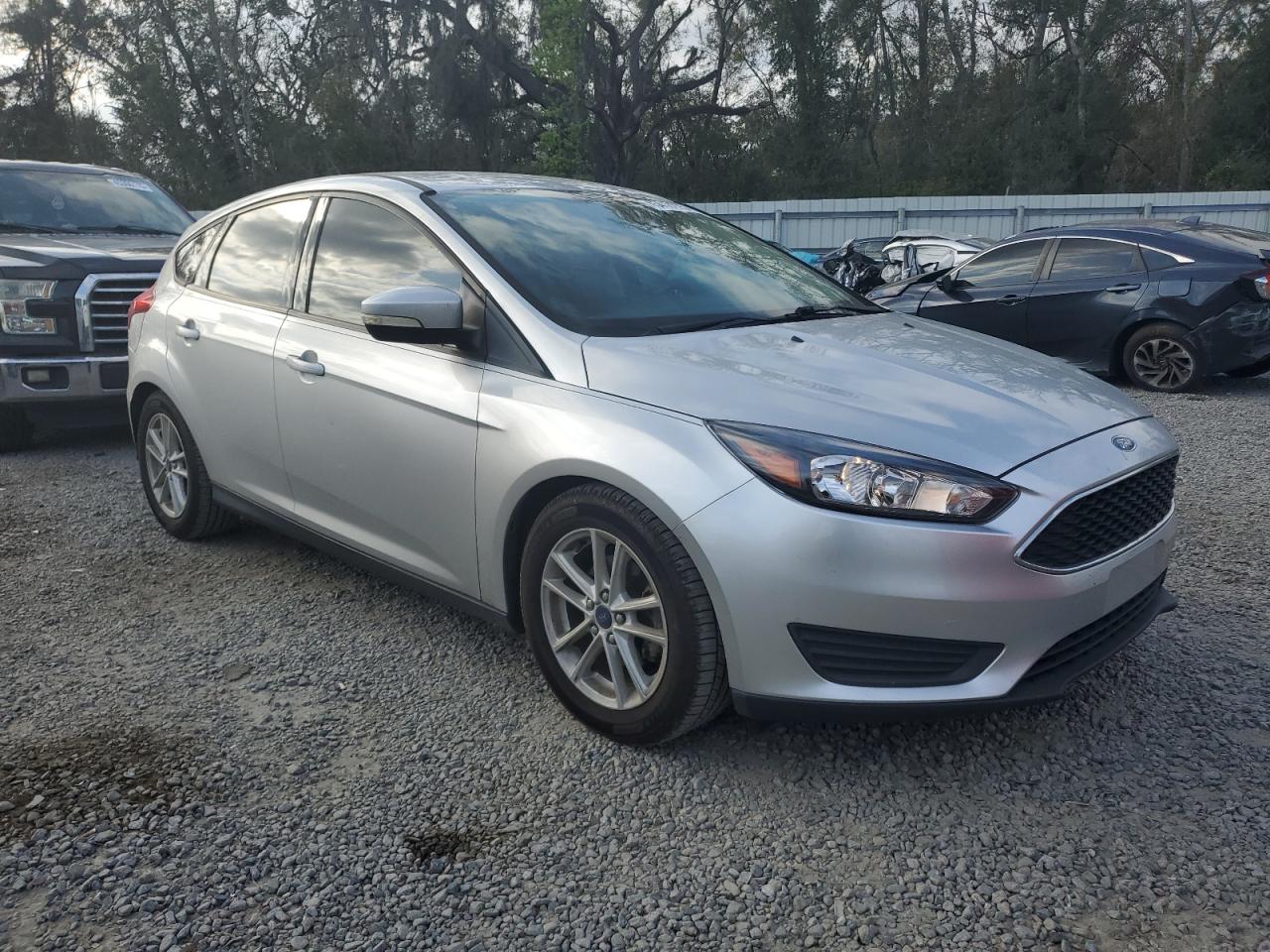 2016 Ford Focus VIN 1FADP3K21GL371373 Copart auction photo, side damage thumbnail 4