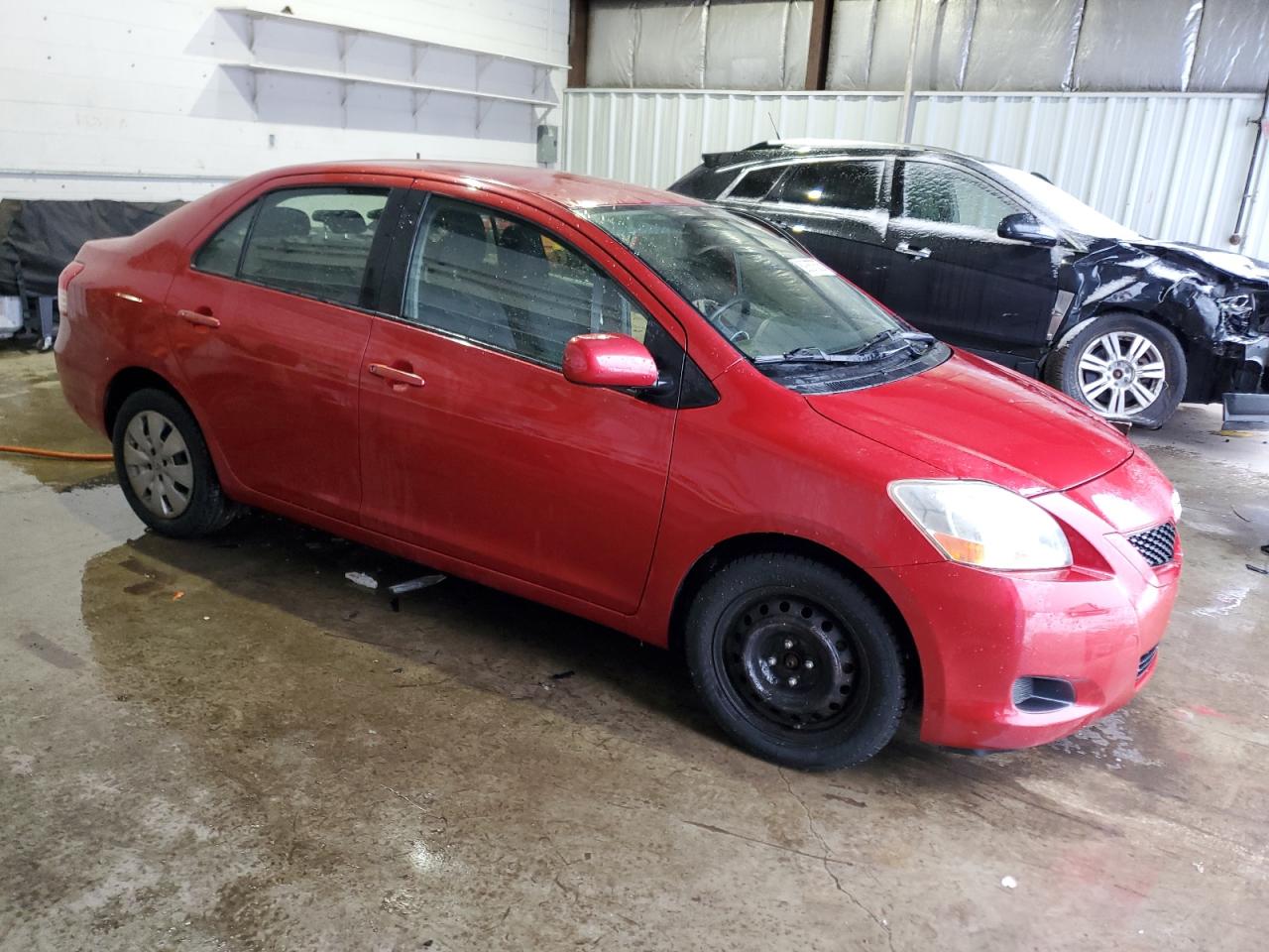 2010 Toyota Yaris VIN JTDBT4K31A1363000 Copart auction photo, side damage thumbnail 4