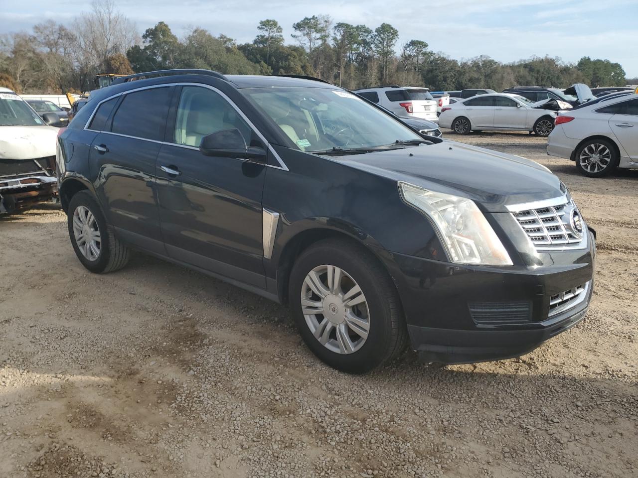 2016 Cadillac SRX VIN 3GYFNAE31GS573975 Copart auction photo, side / front end damage thumbnail 4