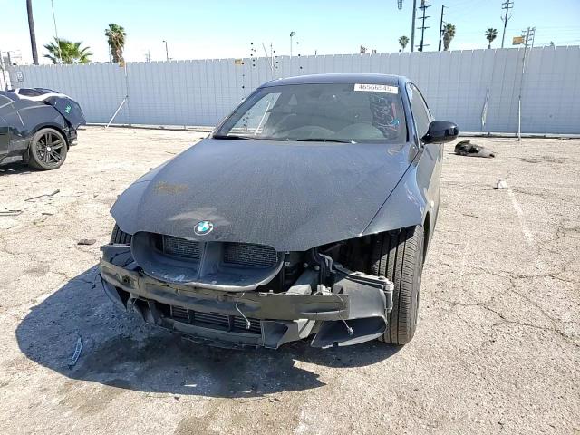 2012 BMW 3er VIN WBAKG1C5XCJ217018 Copart auction photo, front end / minor dent/scratches damage thumbnail 11