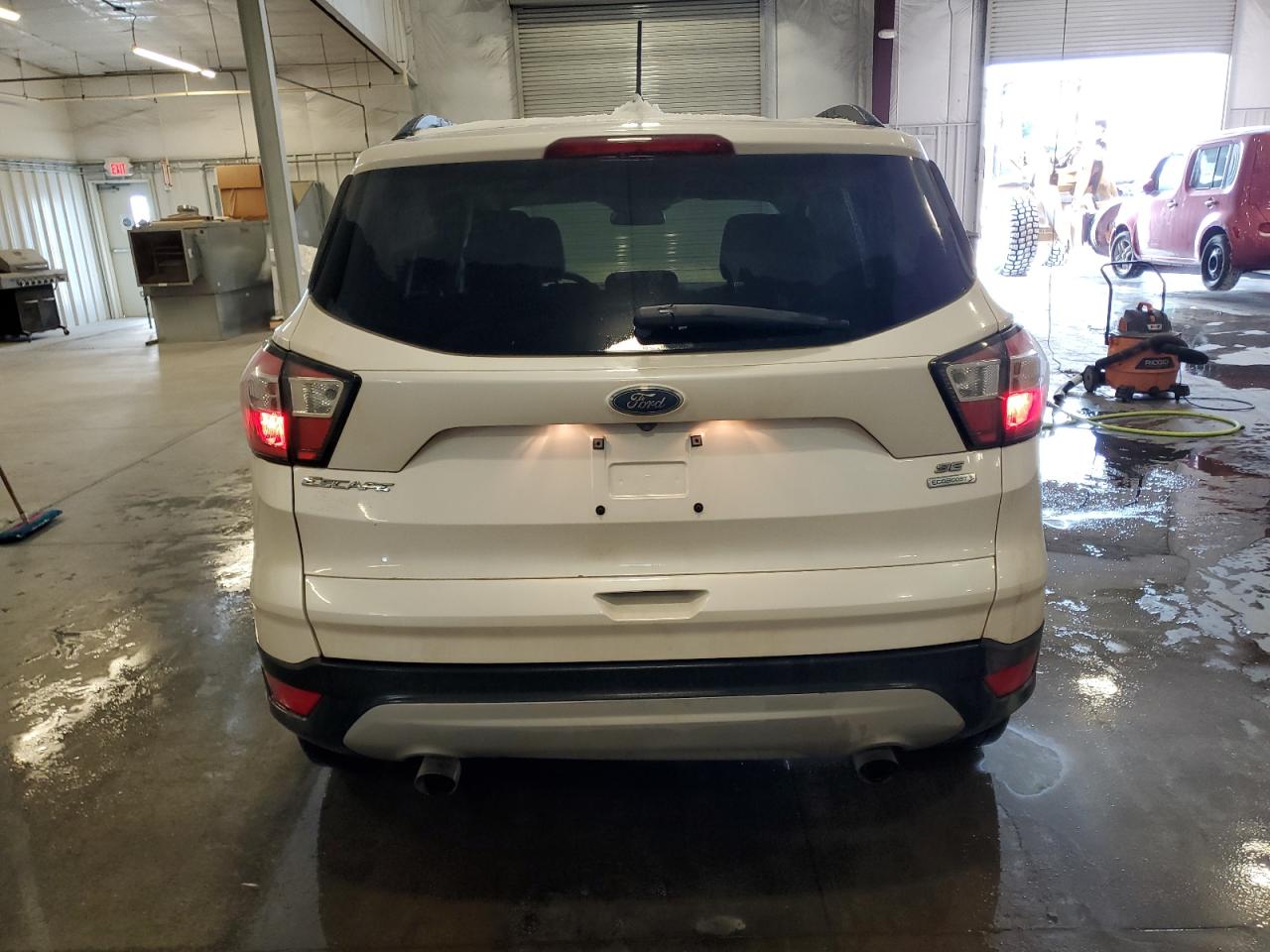 2018 Ford Escape VIN 1FMCU0GD5JUB09974 Copart auction photo, side damage thumbnail 6