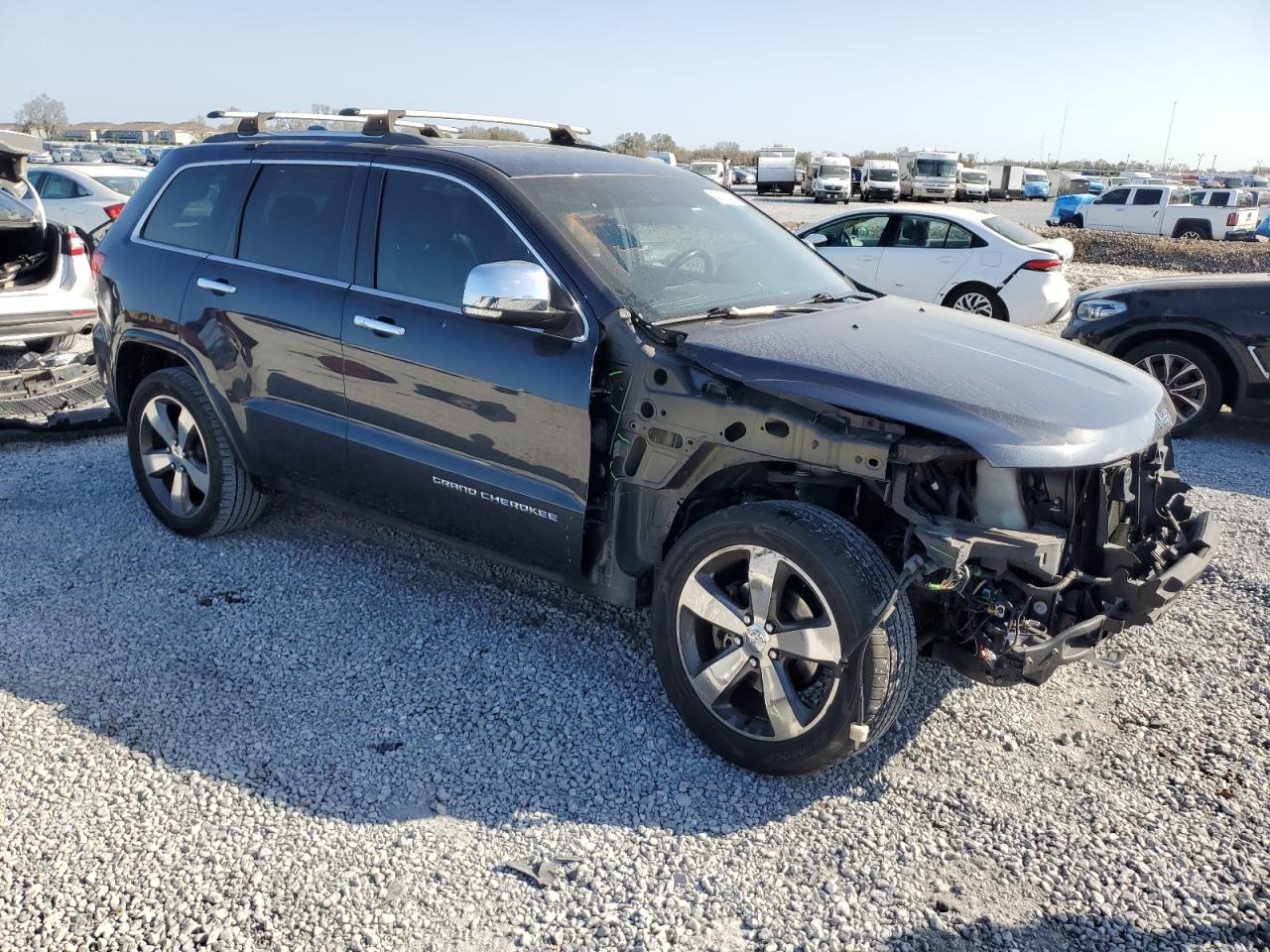 2014 Jeep Grand Cherokee VIN 1C4RJFCG0EC554953 Copart auction photo, front end / undercarriage damage thumbnail 4