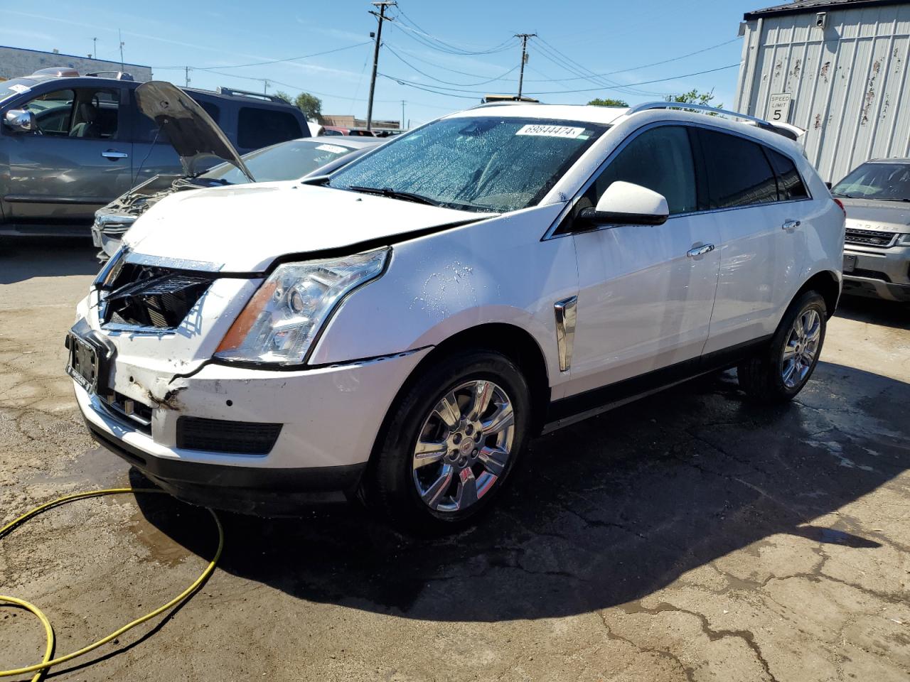 2015 Cadillac SRX VIN 3GYFNBE38FS512577