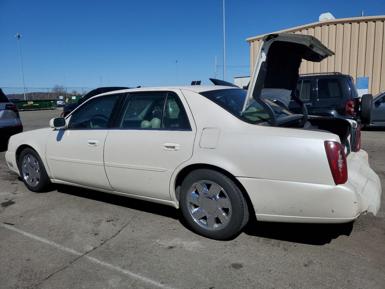 2000 Cadillac De Ville VIN 1G6KF5794YU244556 Copart auction photo, rear end damage thumbnail 2