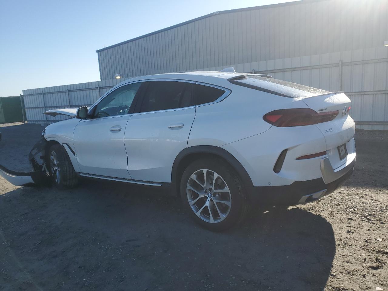2021 BMW X6 VIN 5UXCY6C08M9E54309 Copart auction photo, front end / minor dent/scratches damage thumbnail 2