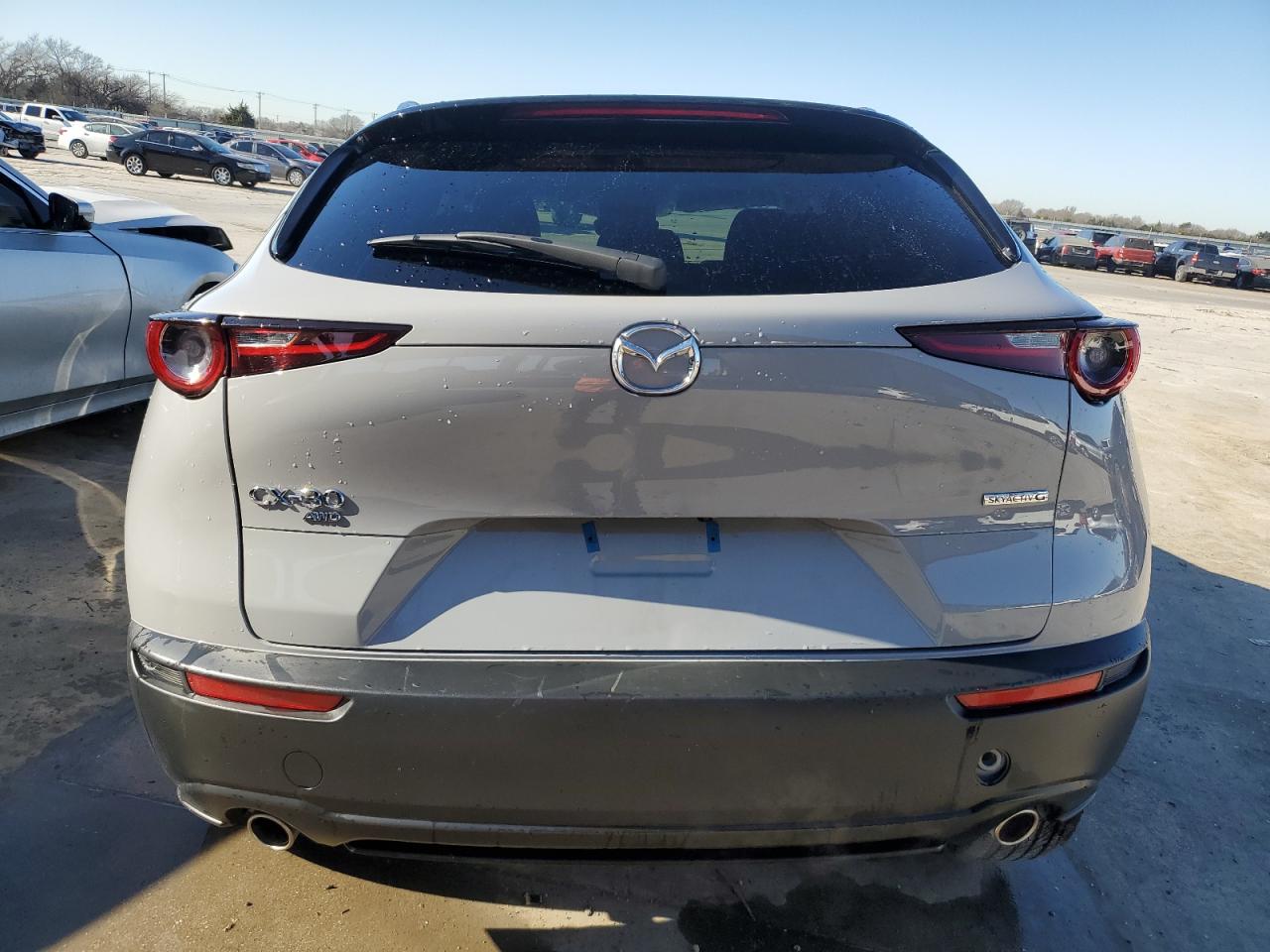 2025 Mazda CX-30 VIN 3MVDMBCM3SM757439 Copart auction photo, undercarriage / hail damage thumbnail 6