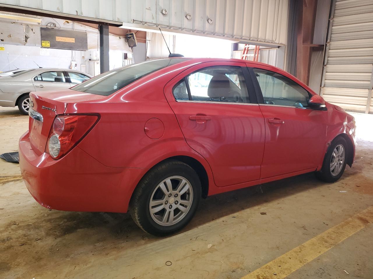 2016 Chevrolet Sonic VIN 1G1JC5SH3G4173096 Copart auction photo, side / front end damage thumbnail 3