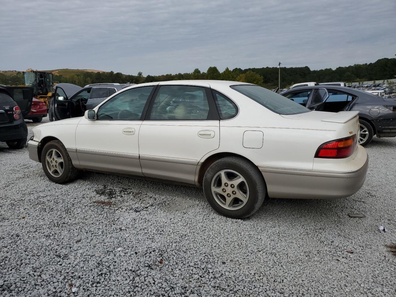 1999 Toyota Avalon VIN 4T1BF18B3XU309236 Copart auction photo, front end / minor dent/scratches damage thumbnail 2
