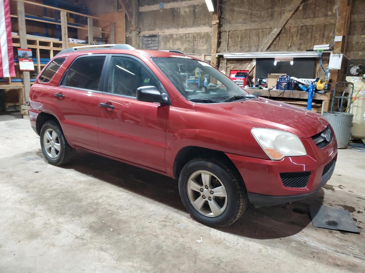 2009 KIA Sportage VIN KNDJF724797570559 Copart auction photo, normal wear / minor dent/scratches damage thumbnail 4