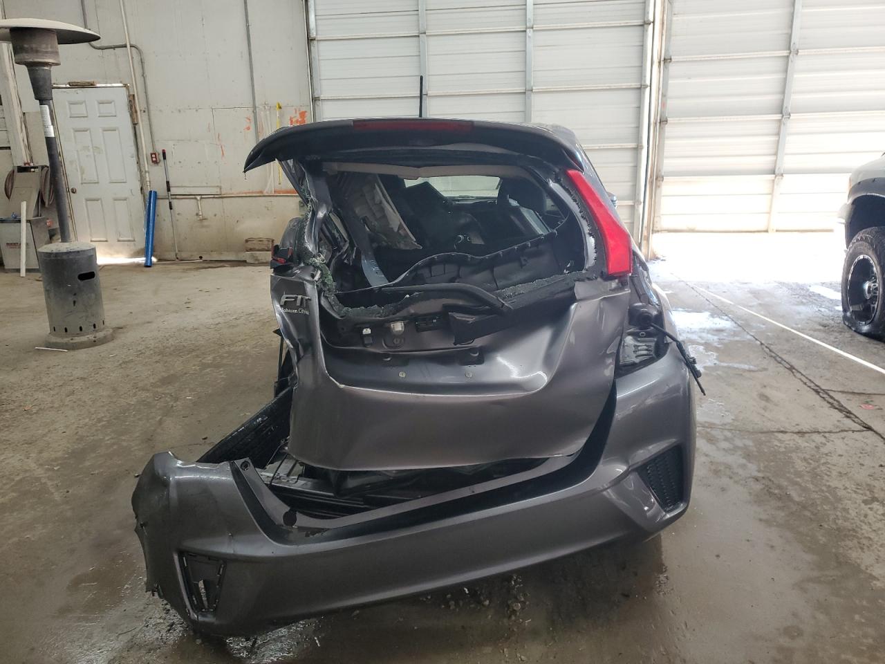2017 Honda Fit VIN JHMGK5H57HS001246 Copart auction photo, all over damage thumbnail 6