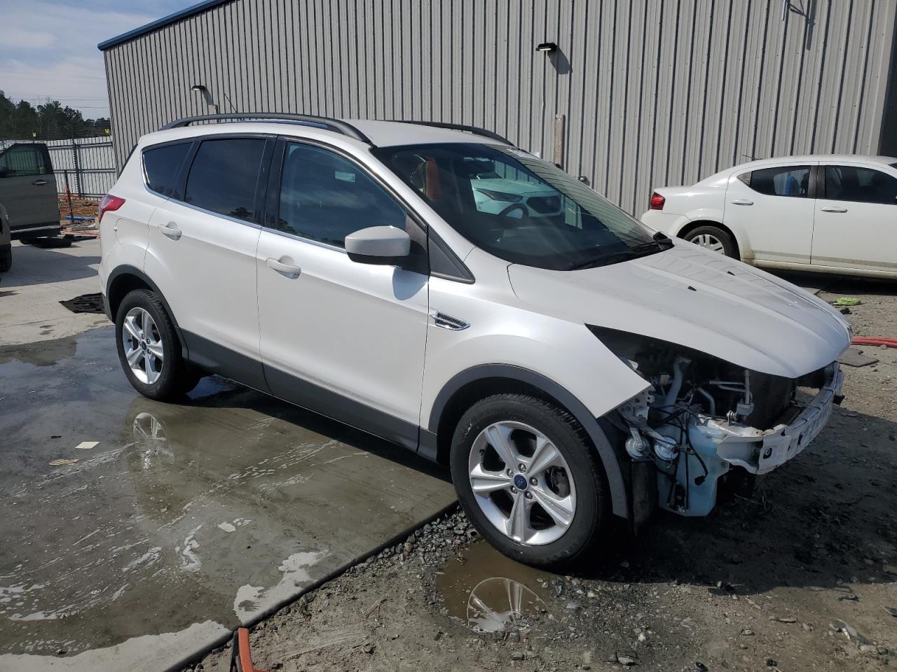 2014 Ford Escape VIN 1FMCU0GX4EUD30515 Copart auction photo, front end damage thumbnail 4