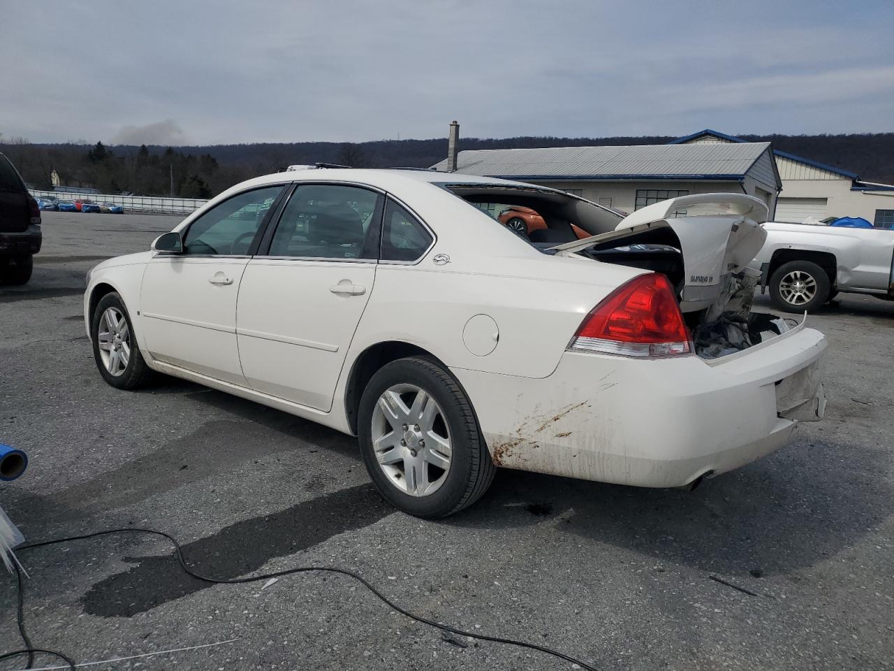 2006 Chevrolet Impala VIN 2G1WC581569409436 Copart auction photo, rear end damage thumbnail 2