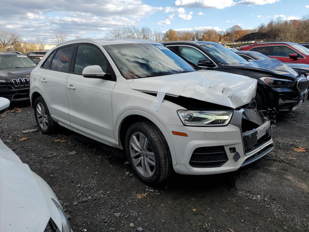 2017 Audi Q3 VIN WA1ECCFS2HR009128 Copart auction photo, front end / minor dent/scratches damage thumbnail 4