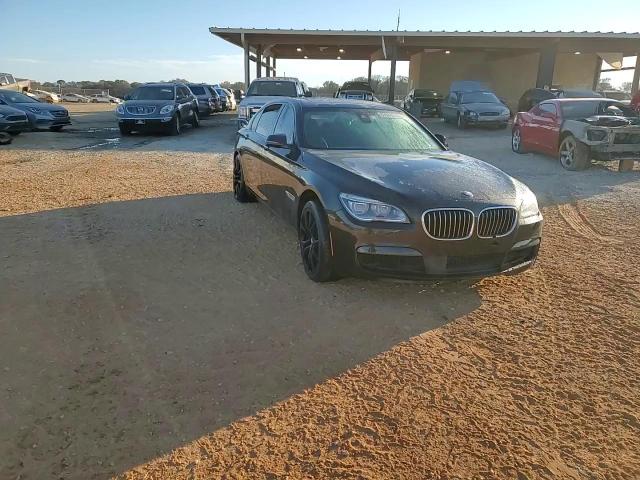 2015 BMW 7er VIN WBAYE8C55FD781557 Copart auction photo, side damage thumbnail 14