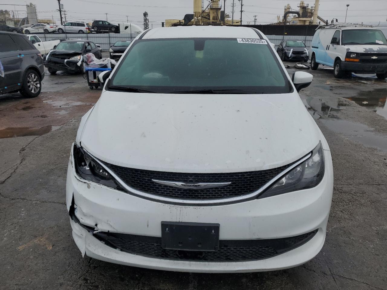 2021 Chrysler Voyager VIN 2C4RC1CG6MR556225 Copart auction photo, front end / side damage thumbnail 5