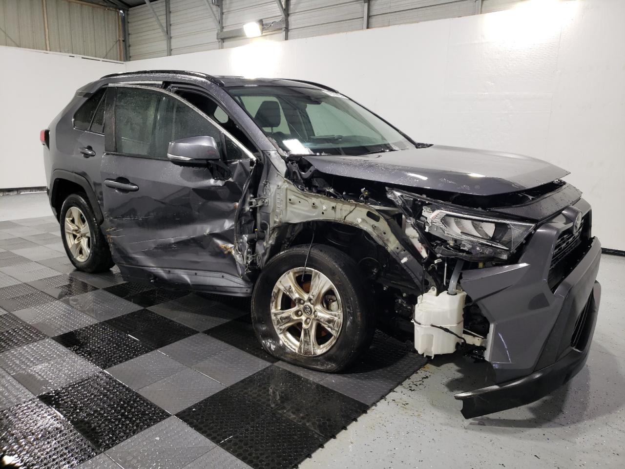 2020 Toyota RAV 4 VIN 2T3W1RFV8LW090853 Copart auction photo, side / front end damage thumbnail 4