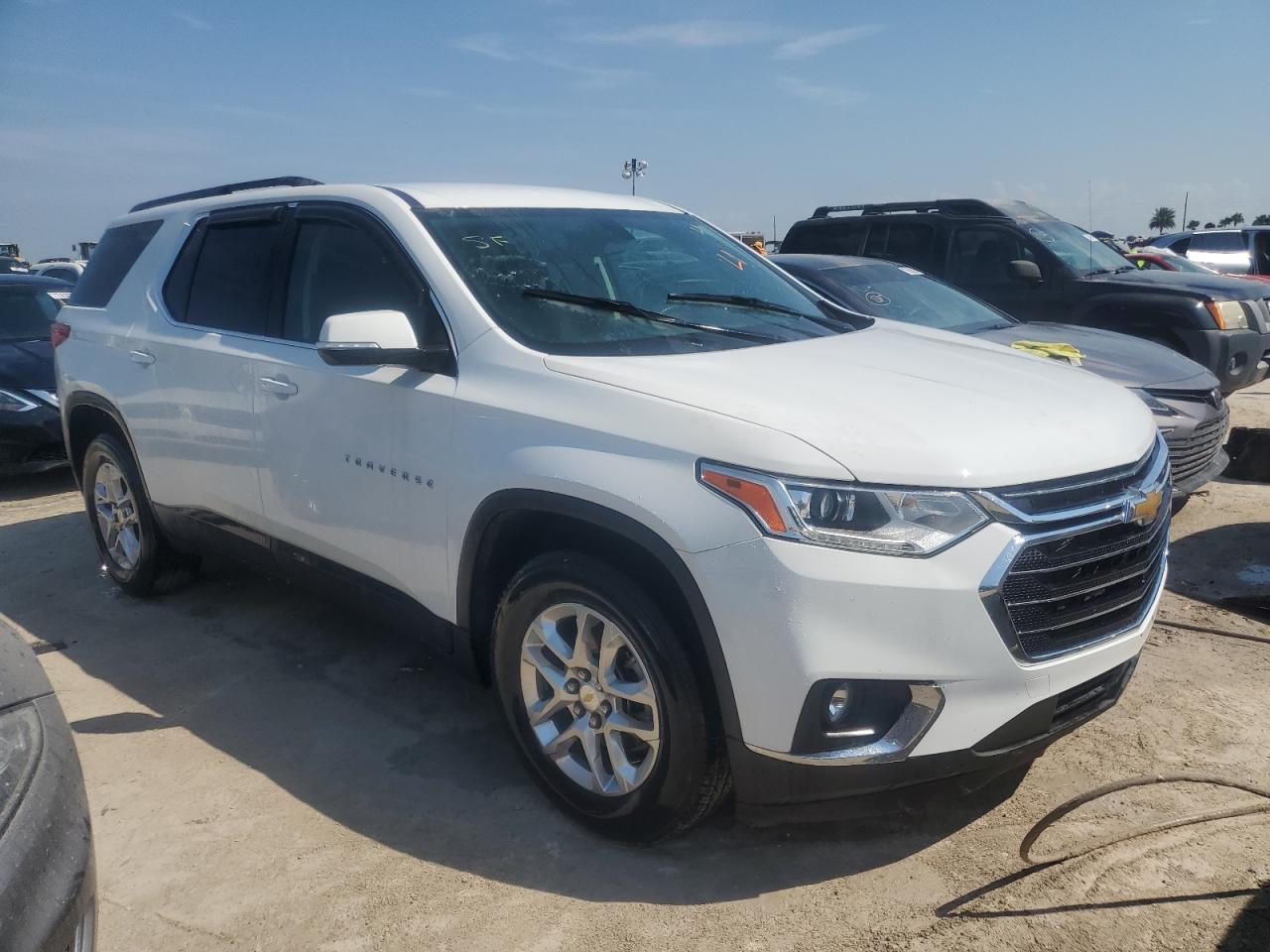 2021 Chevrolet Traverse VIN 1GNEVGKW4MJ219861 Copart auction photo, water/flood damage thumbnail 4