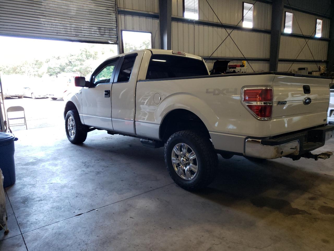 2010 Ford F-150 VIN 1FTFX1EV6AFD11916 Copart auction photo, side / front end damage thumbnail 2