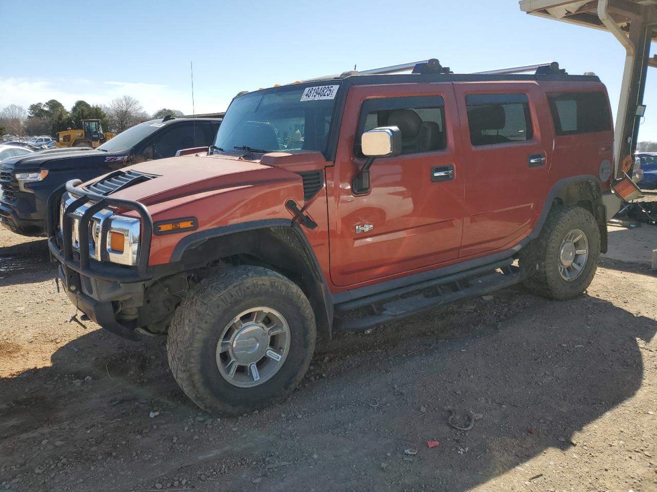 2004 Hummer H2 VIN 5GRGN23U04H104939 - Copart auction photo