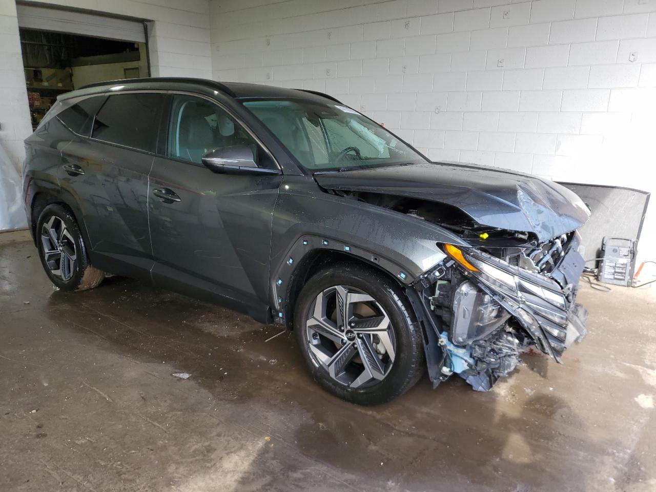 2022 Hyundai Tucson VIN 5NMJC3AEXNH133590 Copart auction photo, all over damage thumbnail 4