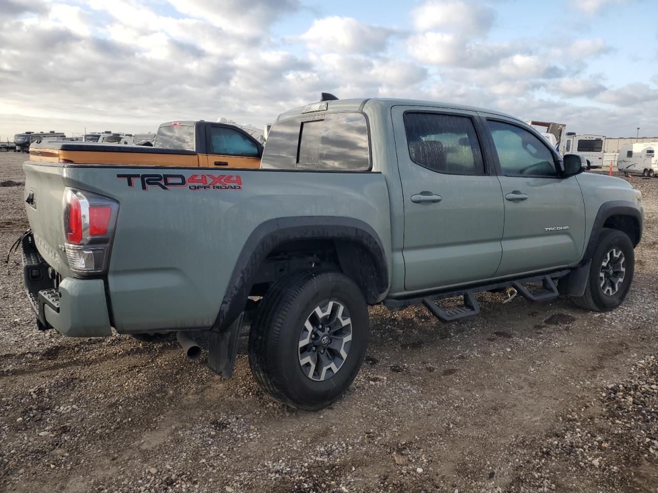 2023 Toyota Tacoma VIN 3TMCZ5AN0PM625550 Copart auction photo, side / rear end damage thumbnail 3