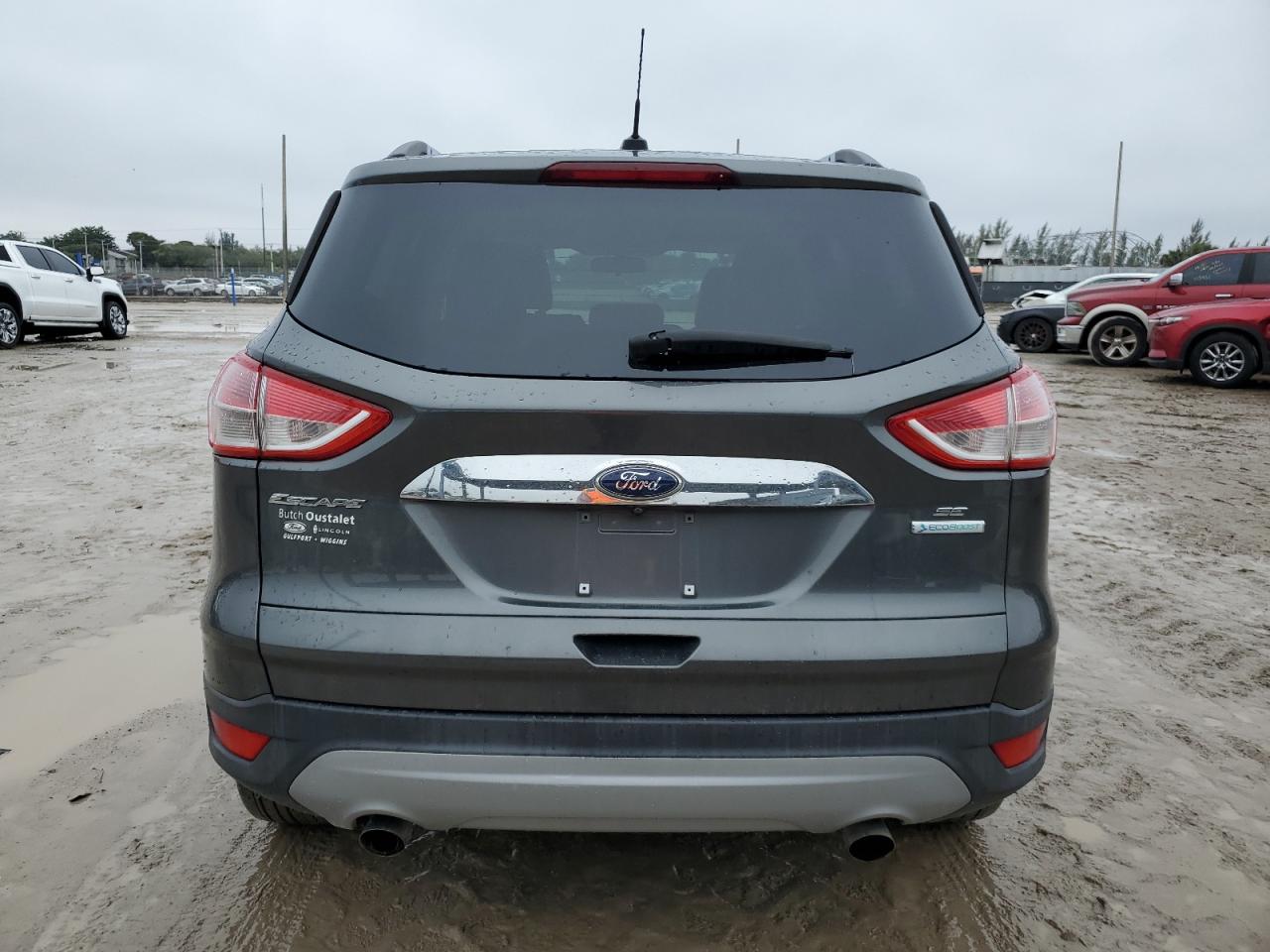 2016 Ford Escape VIN 1FMCU0GX4GUB88833 Copart auction photo, front end / minor dent/scratches damage thumbnail 6