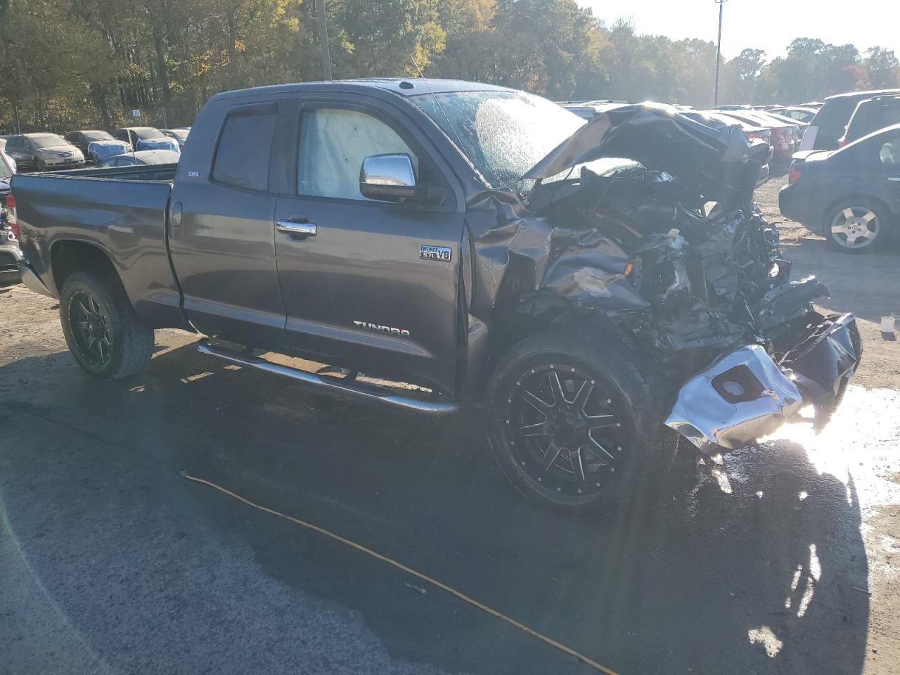 2015 Toyota Tundra VIN 5TFUY5F14FX416009 Copart auction photo, front end / side damage thumbnail 4