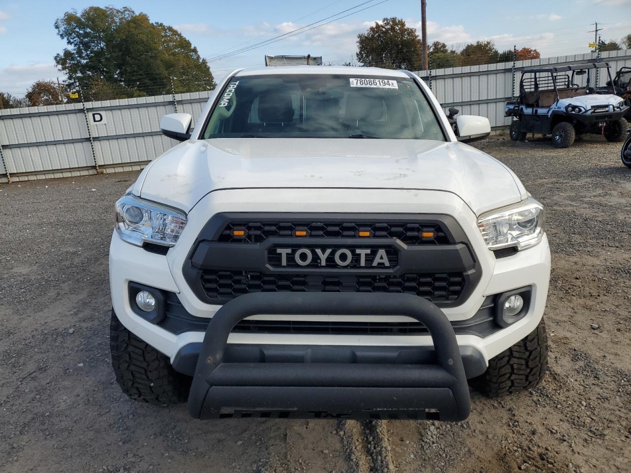 2019 Toyota Tacoma VIN 5TFSZ5ANXKX206300 Copart auction photo, front end / rear end damage thumbnail 5