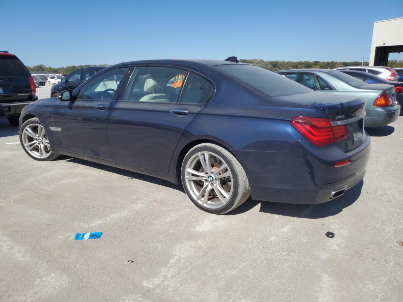 2013 BMW 7er VIN WBAYF8C53DD140112 Copart auction photo, front end damage thumbnail 2