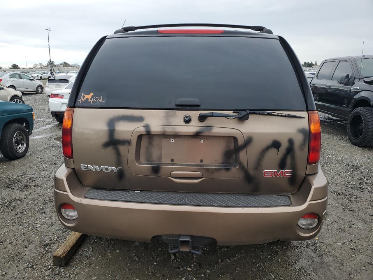 2003 GMC Envoy VIN 1GKDT13S432263407 Copart auction photo, vandalism damage thumbnail 6