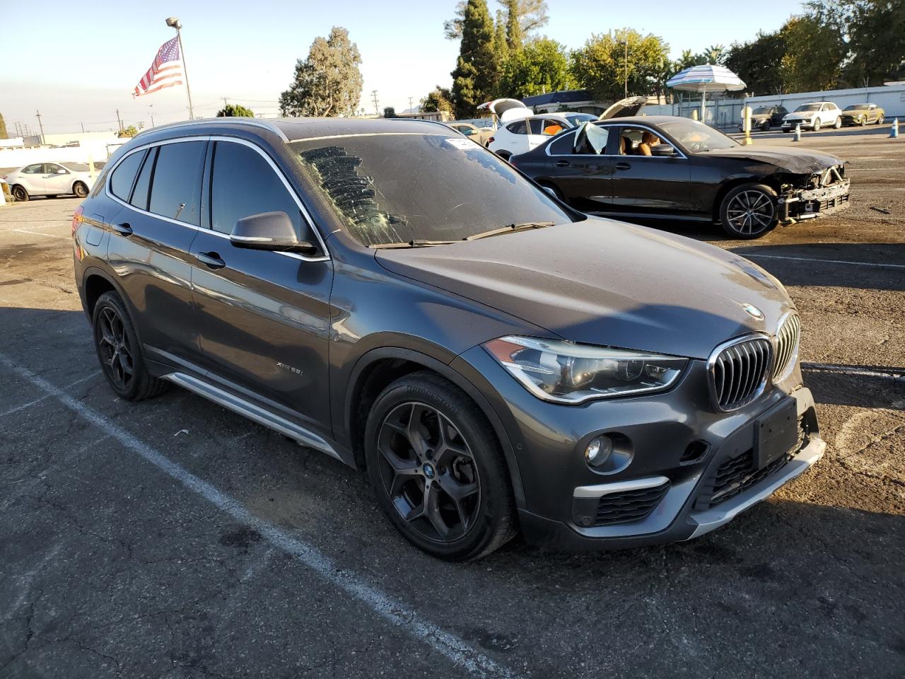 2016 BMW X1 VIN WBXHT3C34GP889889 Copart auction photo, front end / undercarriage damage thumbnail 4