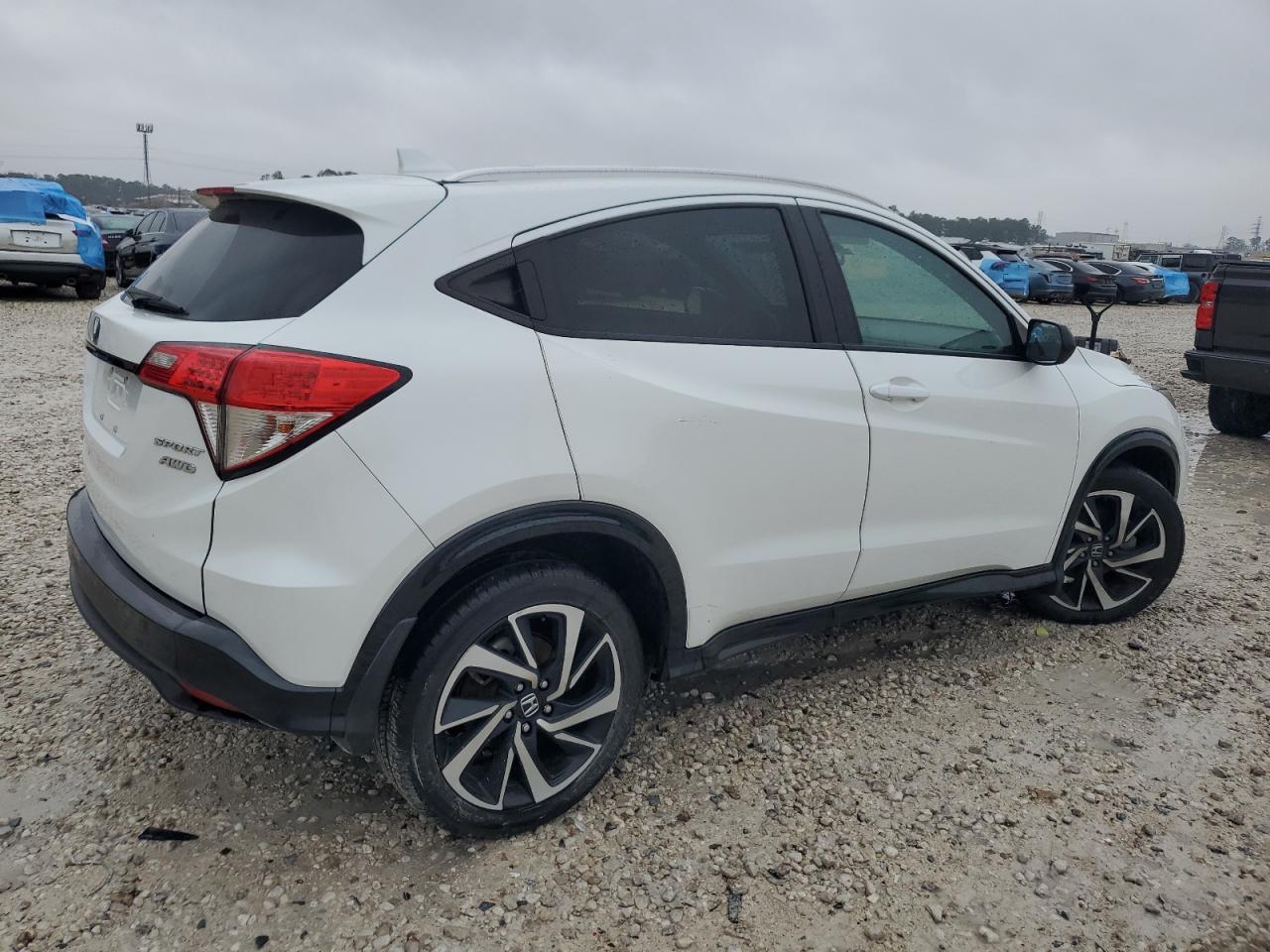 2019 Honda HR-V VIN 3CZRU6H18KM706204 Copart auction photo, side / front end damage thumbnail 3