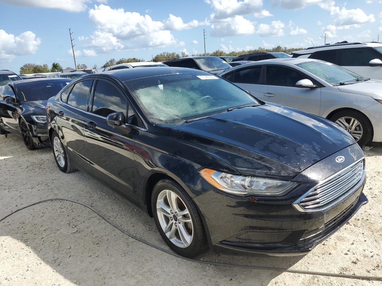 2018 Ford Fusion VIN 3FA6P0HD7JR183739 Copart auction photo, water/flood damage thumbnail 4
