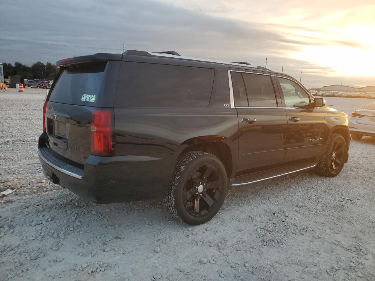 2016 Chevrolet Suburban VIN 1GNSKJKC6GR209885 Copart auction photo, side damage thumbnail 3