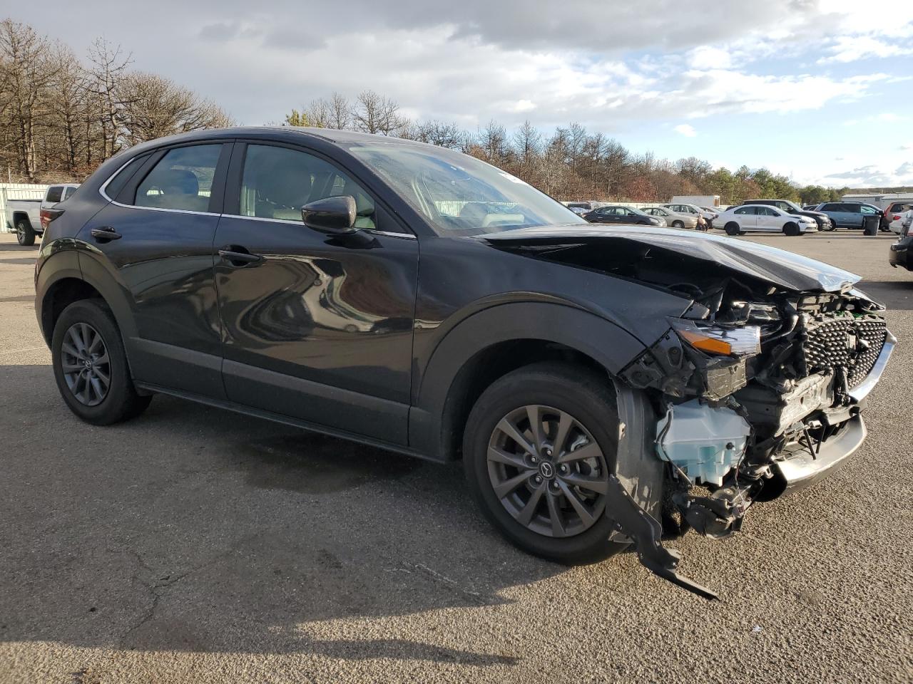 2023 Mazda CX-30 VIN 3MVDMBAM5PM523586 Copart auction photo, front end / minor dent/scratches damage thumbnail 4