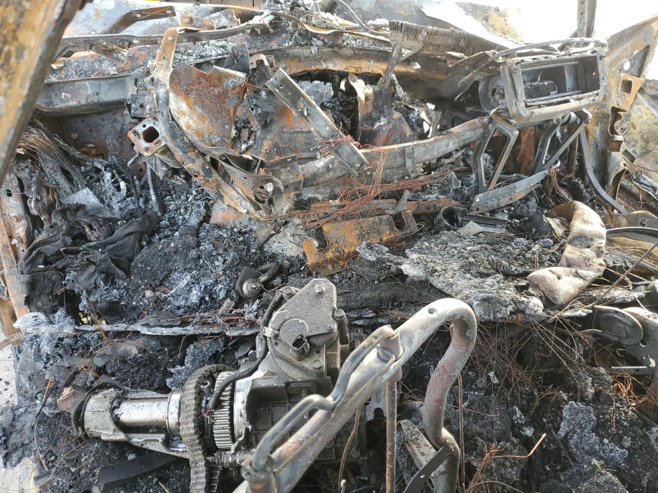 2002 Chevrolet Silverado VIN 1GCGK13U02F246396 Copart auction photo, burn damage thumbnail 8