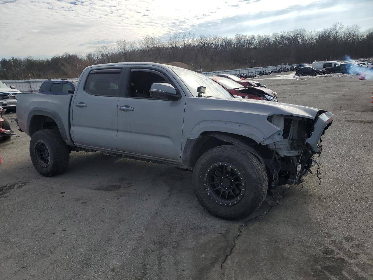 2021 Toyota Tacoma VIN 3TMCZ5AN5MM374391 Copart auction photo, all over damage thumbnail 4