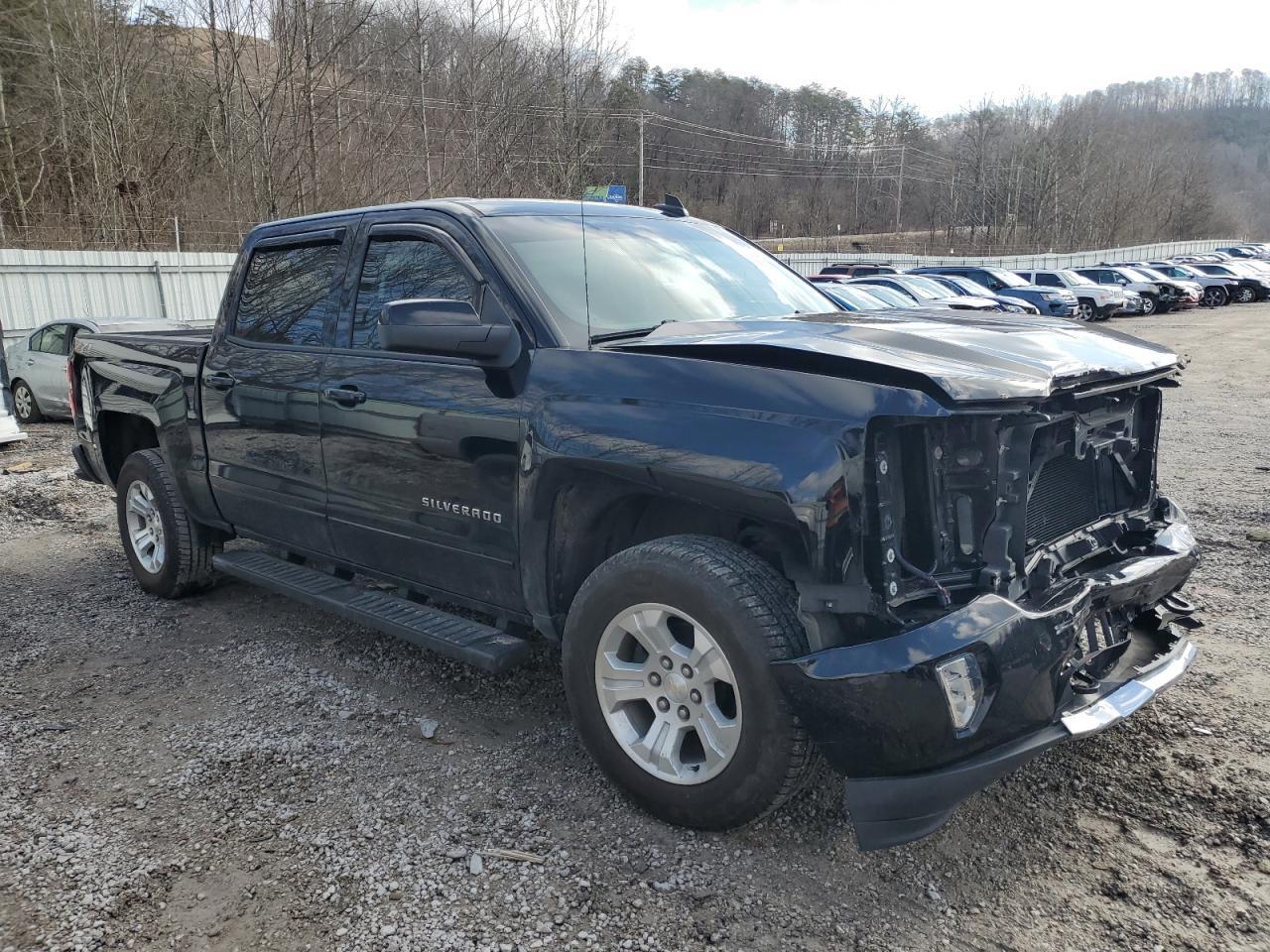 2018 Chevrolet Silverado VIN 3GCUKREC6JG621257 Copart auction photo, front end / side damage thumbnail 4