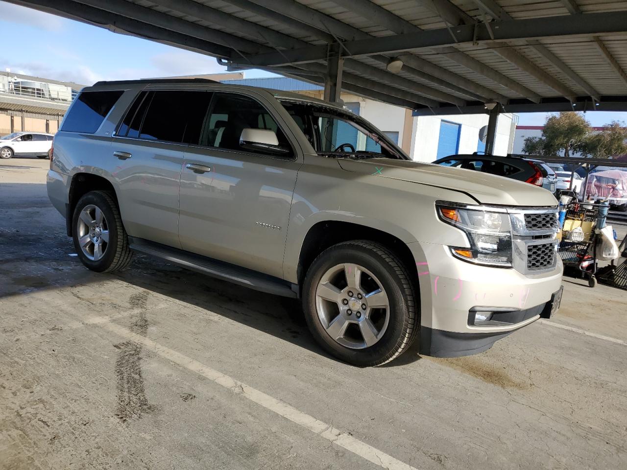 2015 Chevrolet Tahoe VIN 1GNSKBKC5FR567385 Copart auction photo, all over damage thumbnail 4