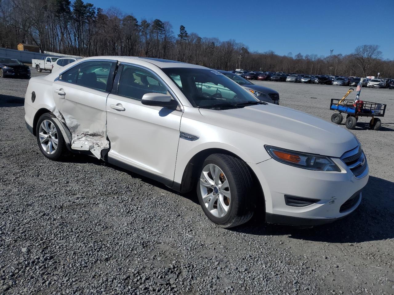 2012 Ford Taurus VIN 1FAHP2EW2CG133917 Copart auction photo, side / rear end damage thumbnail 4