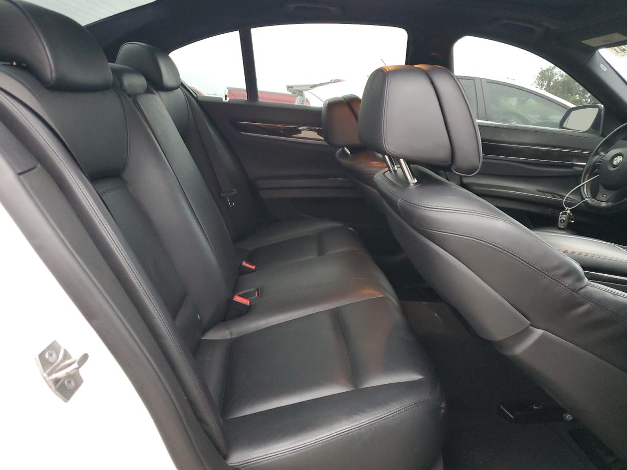 2013 BMW 7er VIN WBAYA8C54DC996569 Copart auction photo, rear end damage thumbnail 10