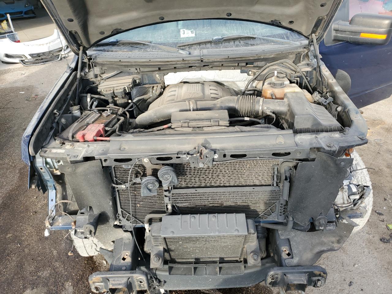 2011 Ford F-150 VIN 1FTFW1ET4BFB13385 Copart auction photo, front end / side damage thumbnail 11
