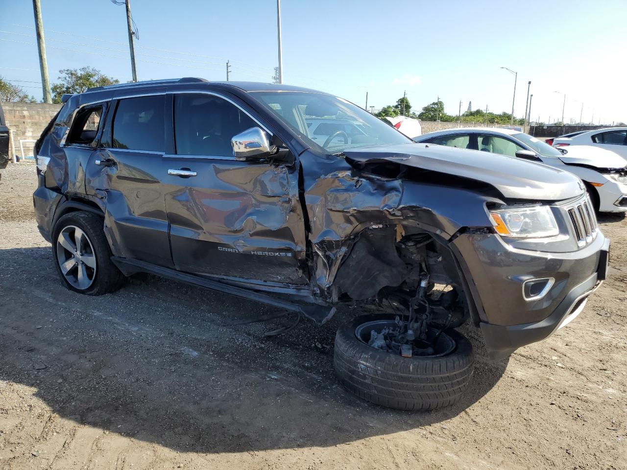 2015 Jeep Grand Cherokee VIN 1C4RJEBG0FC615182 Copart auction photo, all over damage thumbnail 4