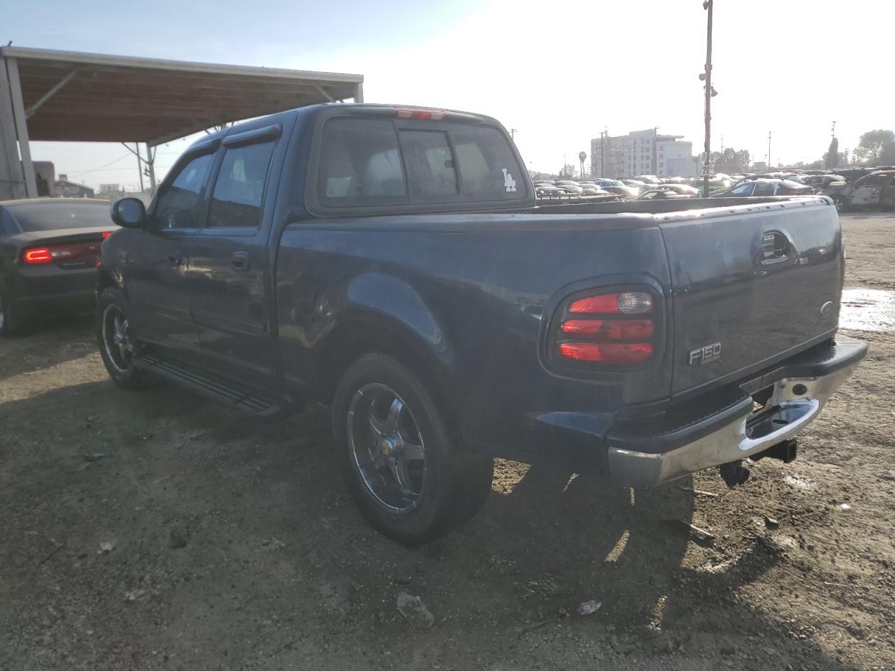 2002 Ford F-150 VIN 1FTRW07LX2KC22722 Copart auction photo, rear end / stripped damage thumbnail 2