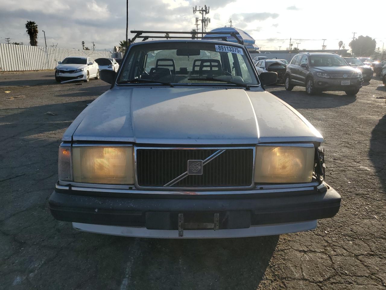 1990 Volvo 240 Series VIN YV1AA8844L1393744 Copart auction photo, front end damage thumbnail 5